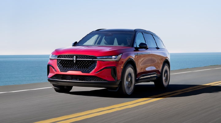 A 2025 Lincoln Nautilus® SUV is being driven on a seaside roadway. | Haldeman Lincoln in Allentown PA