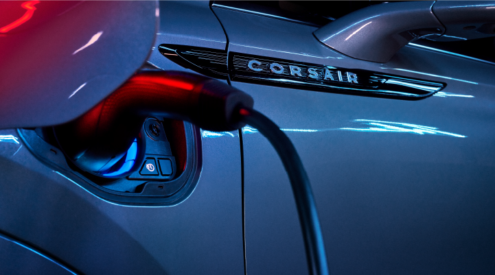 A charger plugged into the charging port of a 2025 Lincoln Corsair® Plug-in Hybrid model. | Haldeman Lincoln in Allentown PA