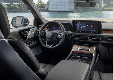 The interior of the 2026 Lincoln Aviator® SUV is shown parked with a view of a harbor through the windshield. | Haldeman Lincoln in Allentown PA