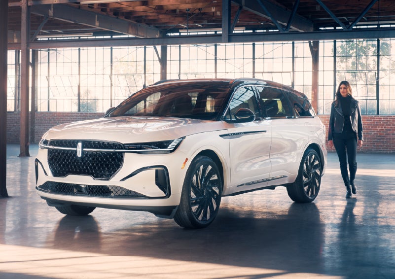 A person approaches a 2026 Lincoln Nautilus® SUV. | Haldeman Lincoln in Allentown PA