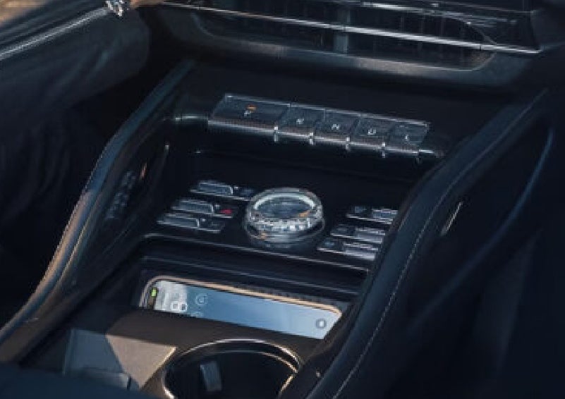 A smartphone is shown charging in the wireless charging pad. | Haldeman Lincoln in Allentown PA