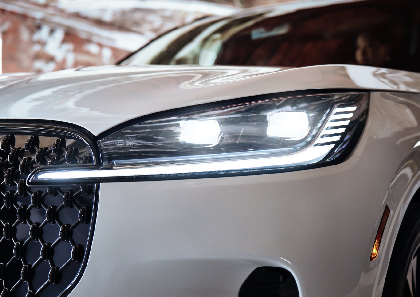 A close-up of a headlamp on the 2027 Lincoln Aviator® SUV is shown. | Haldeman Lincoln in Allentown PA